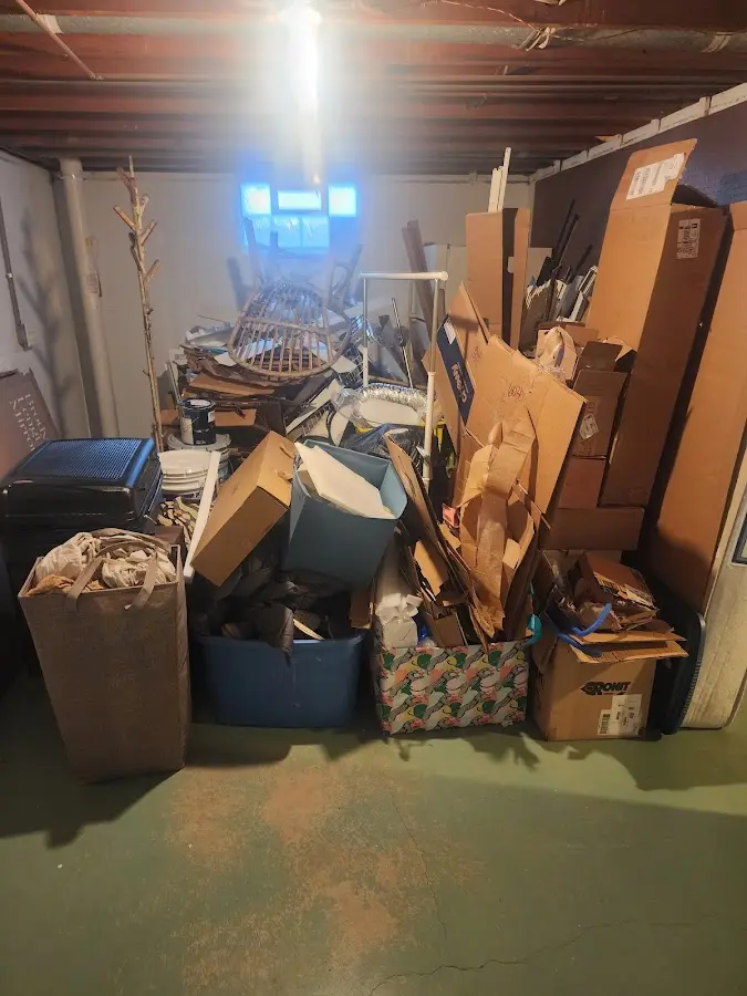 Roll-off dumpster container at job site for Yard Waste Dumpster Rental in Derby